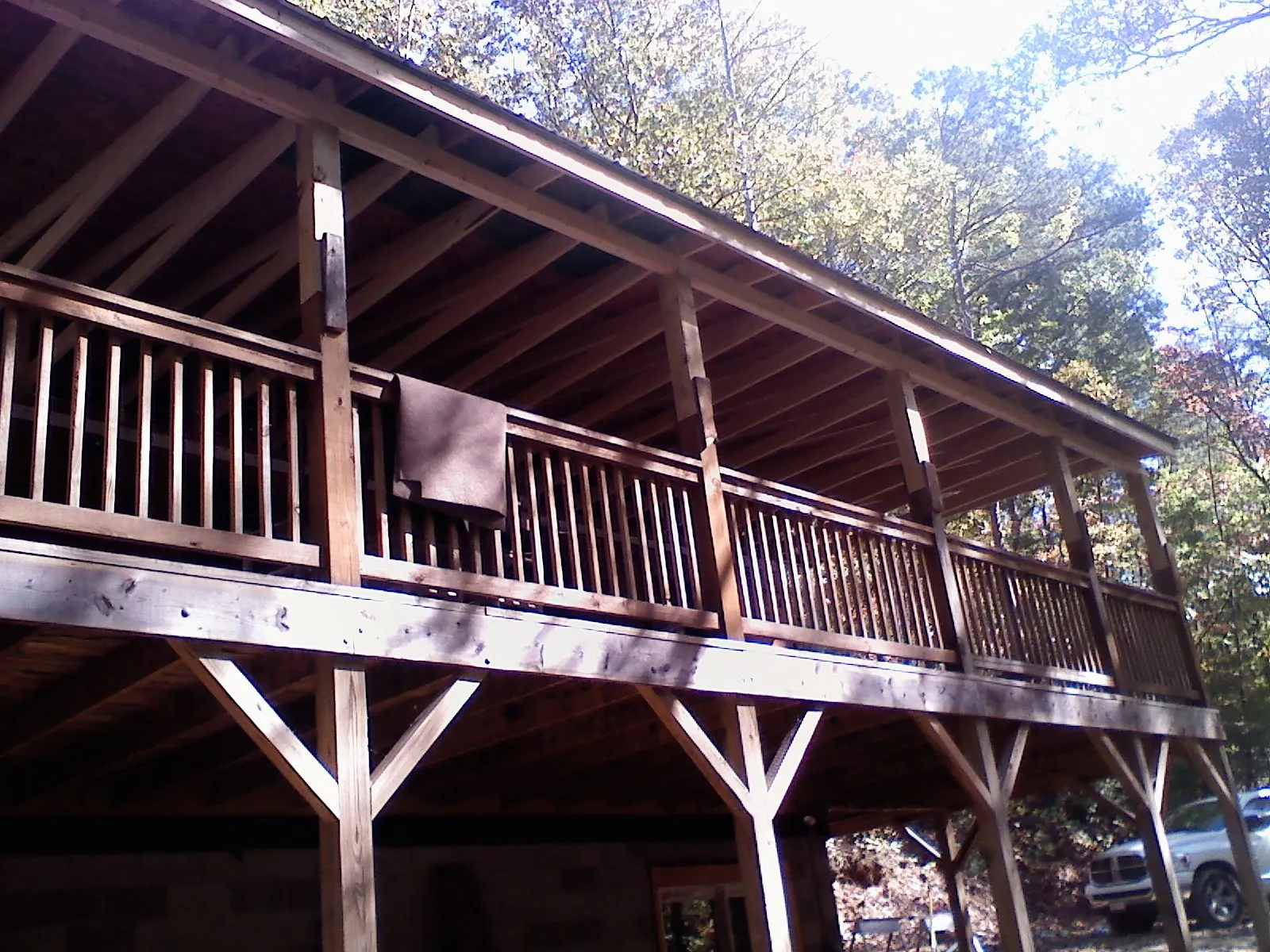 Timber framing under a new elevated porch and deck — Roof Leak Repair in Buckingham by Roofing Brothers